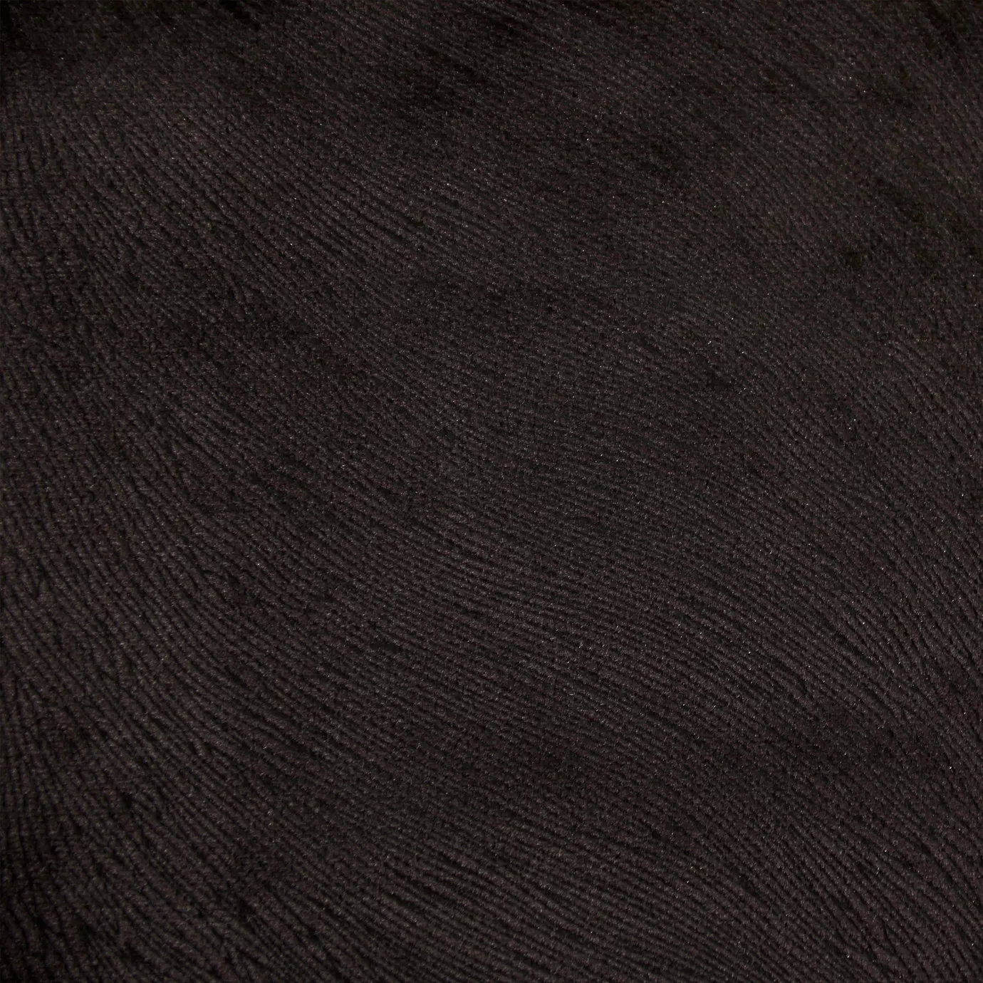 Hide Velvet 021 Fabric with a sleek, deep black hue and subtle textured pattern, showcasing its luxurious and versatile appearance.