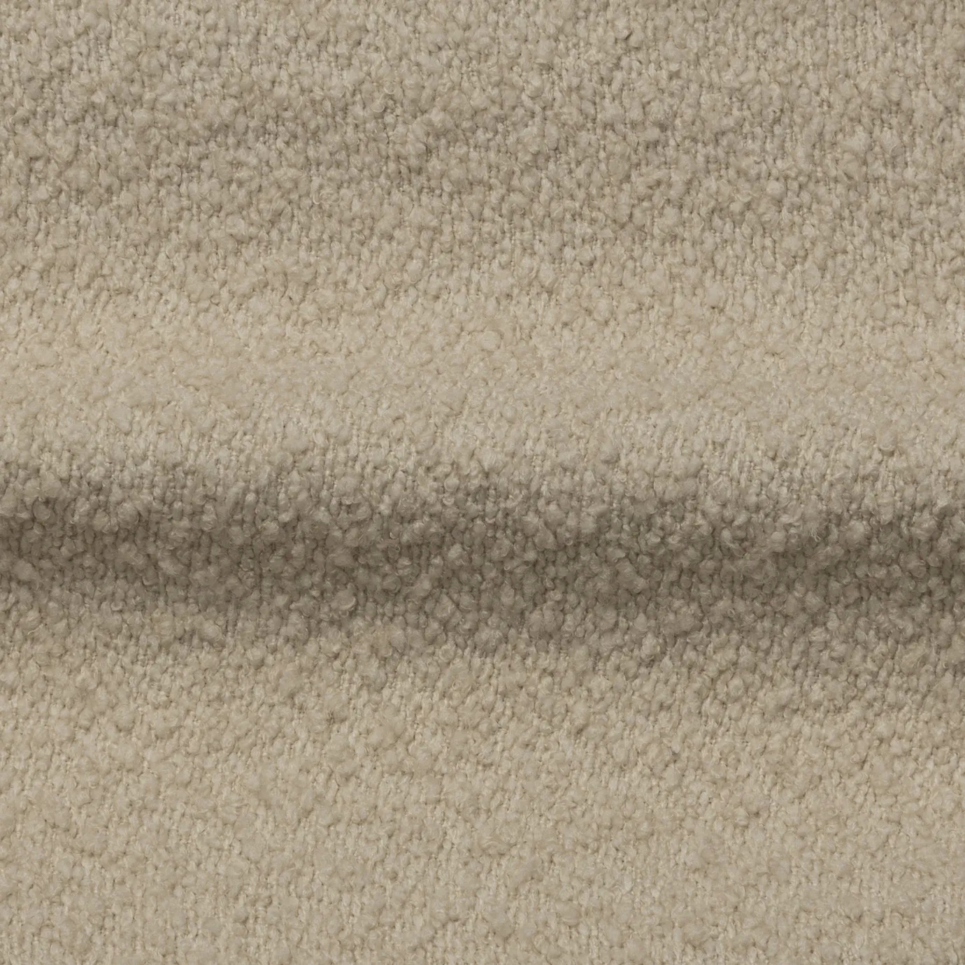 Soft Beige Iconic Boucle fabric with a textured, looped surface in a warm, neutral beige tone.