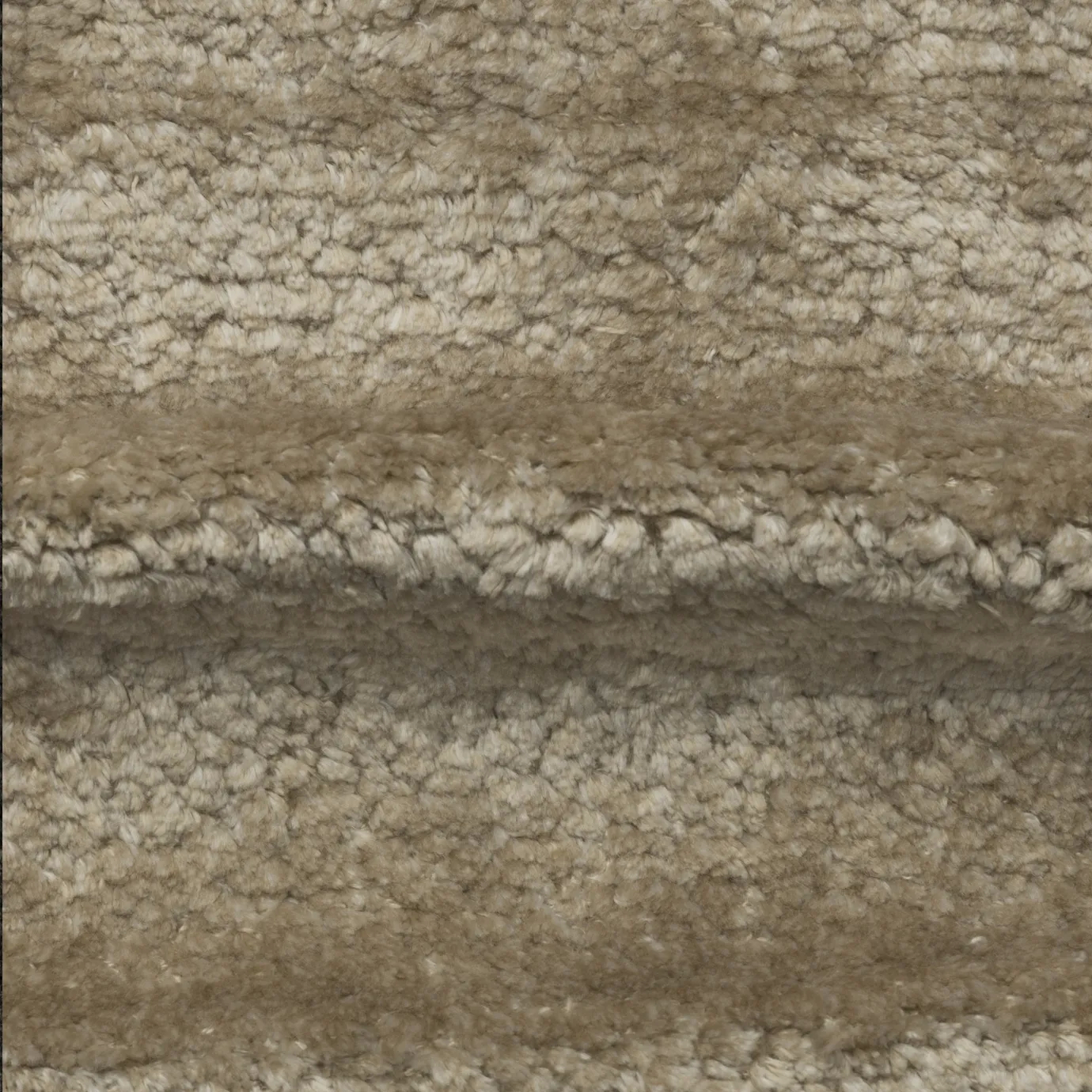 Close-up of Beige Royal Lush Velvet Fabric, displaying its soft, textured surface and rich, warm tone.