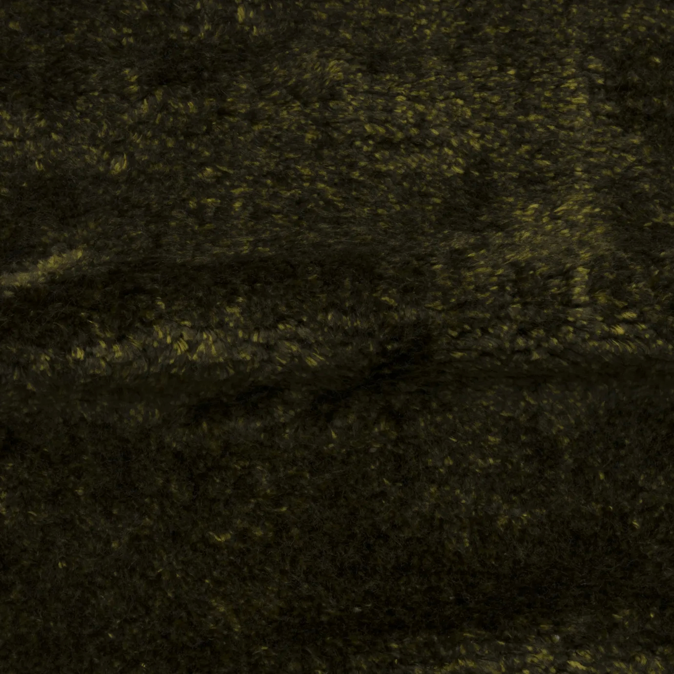 Close-up of Mousse Vert Lush Velvet Fabric, showcasing its soft, textured surface and deep moss green color.