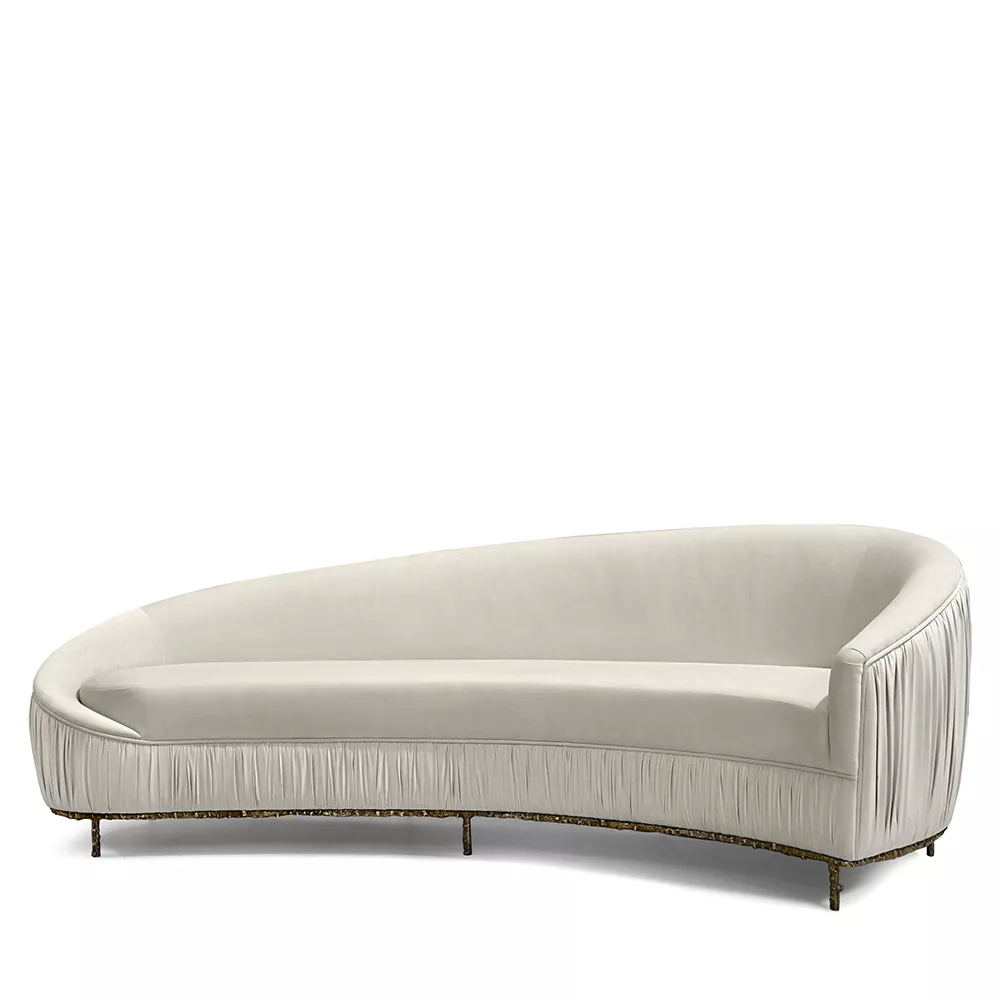 Upholstered in sumptuous fabric, the cast brass metal resembling a thorn bush branch serves as a base to this luscious lounge sofa.