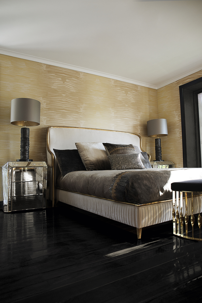 Sensual sculptural headboard with metallic leaf detail