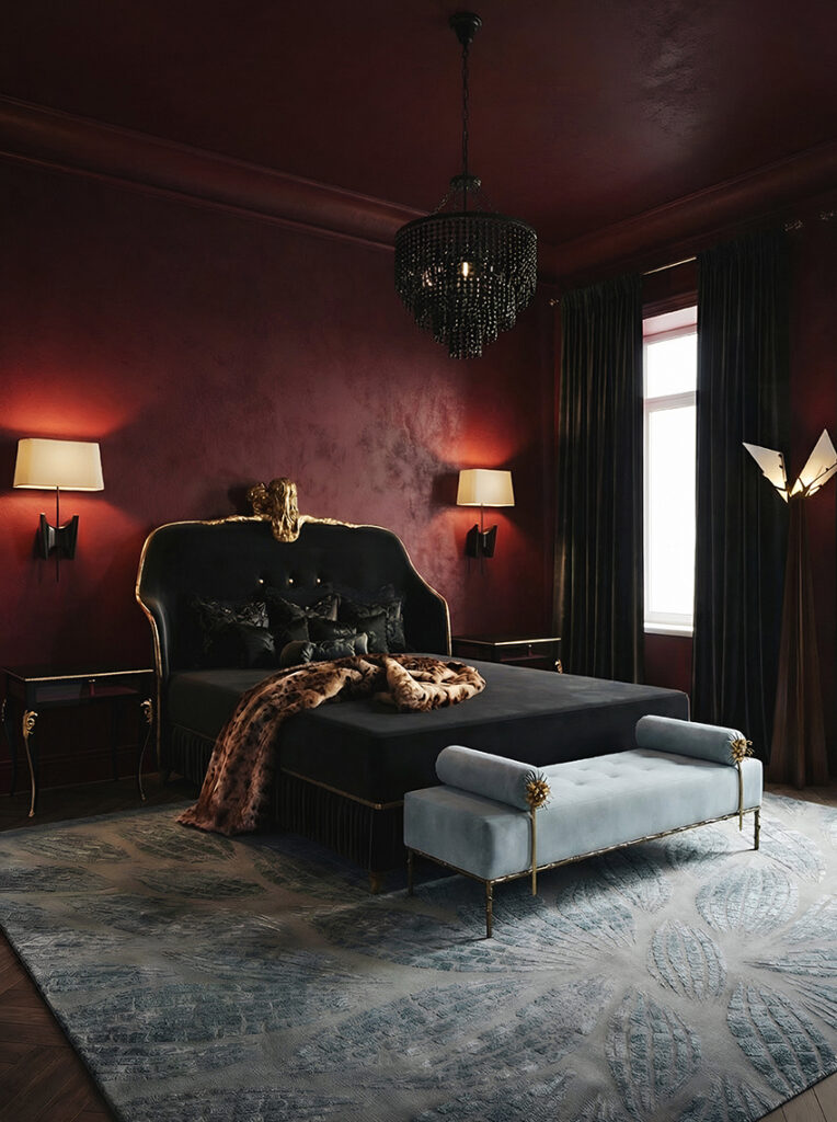 Luxury bedroom with dramatic lighting and upholstered headboard