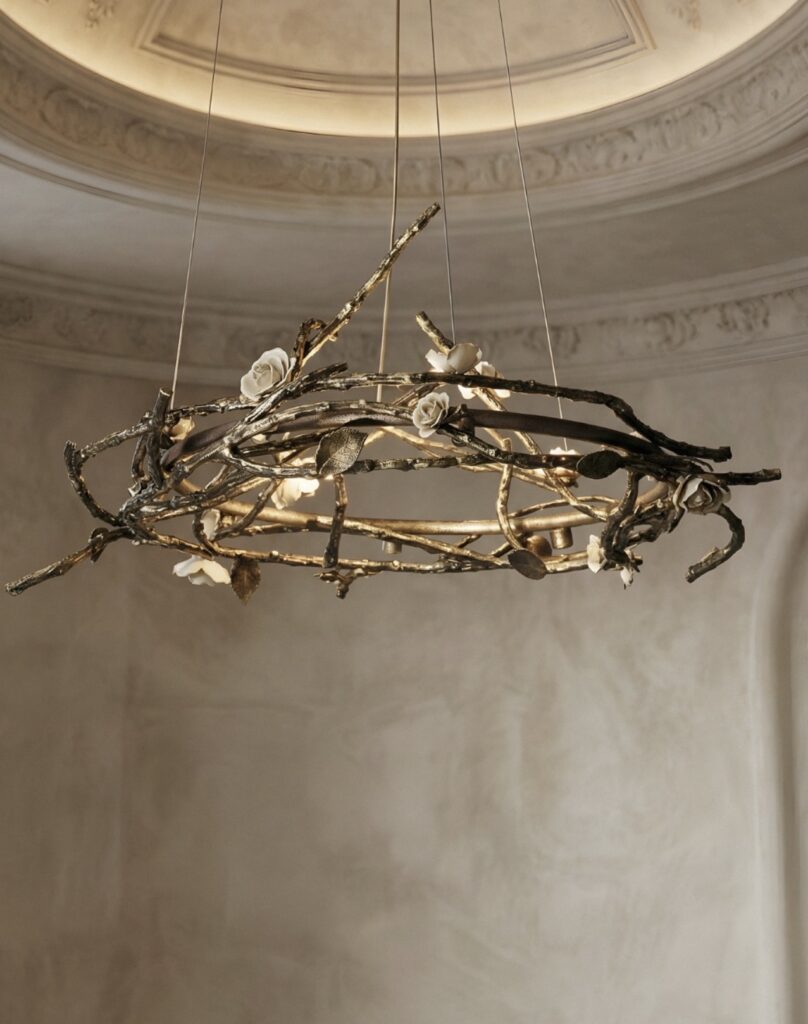 Luxury chandelier by KOKET with sculptural design and warm lighting