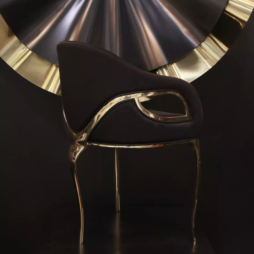 Chandra Chair in espresso velvet against the circular Goddess Mirror