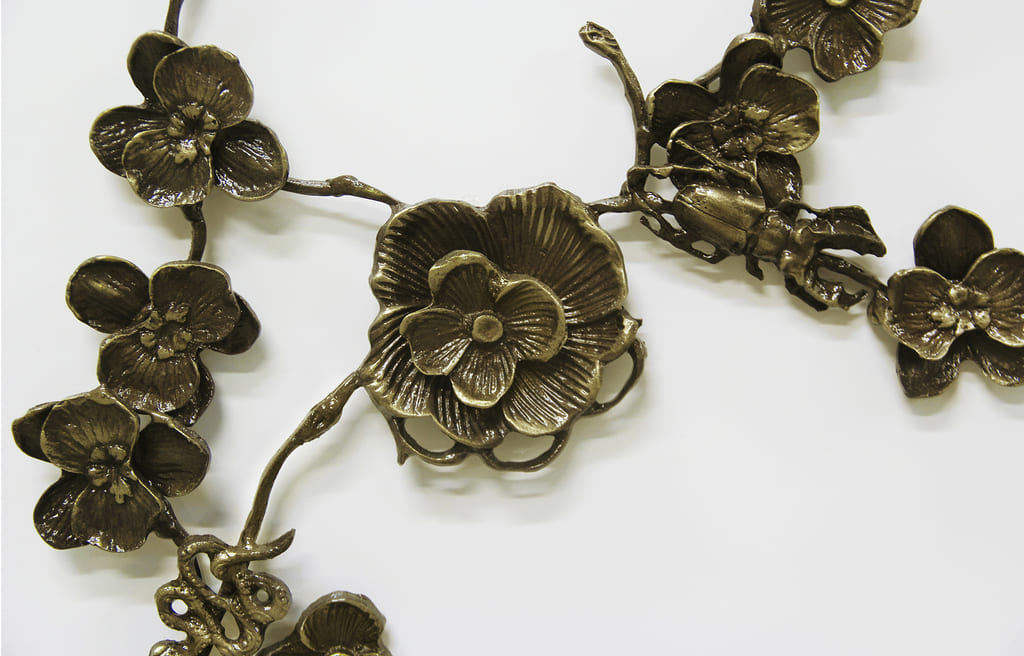 spellbound flower furniture detail white and brass